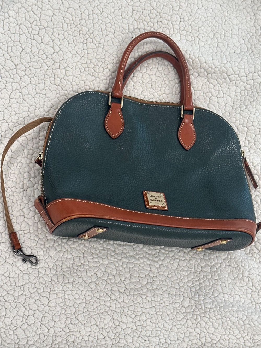 Beautiful Dooney & Bourke bag dark teal color with brown and gold-tone hardware